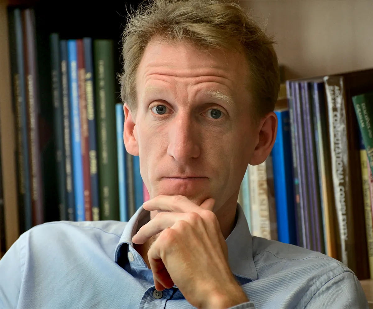 A portrait of Ben Green.